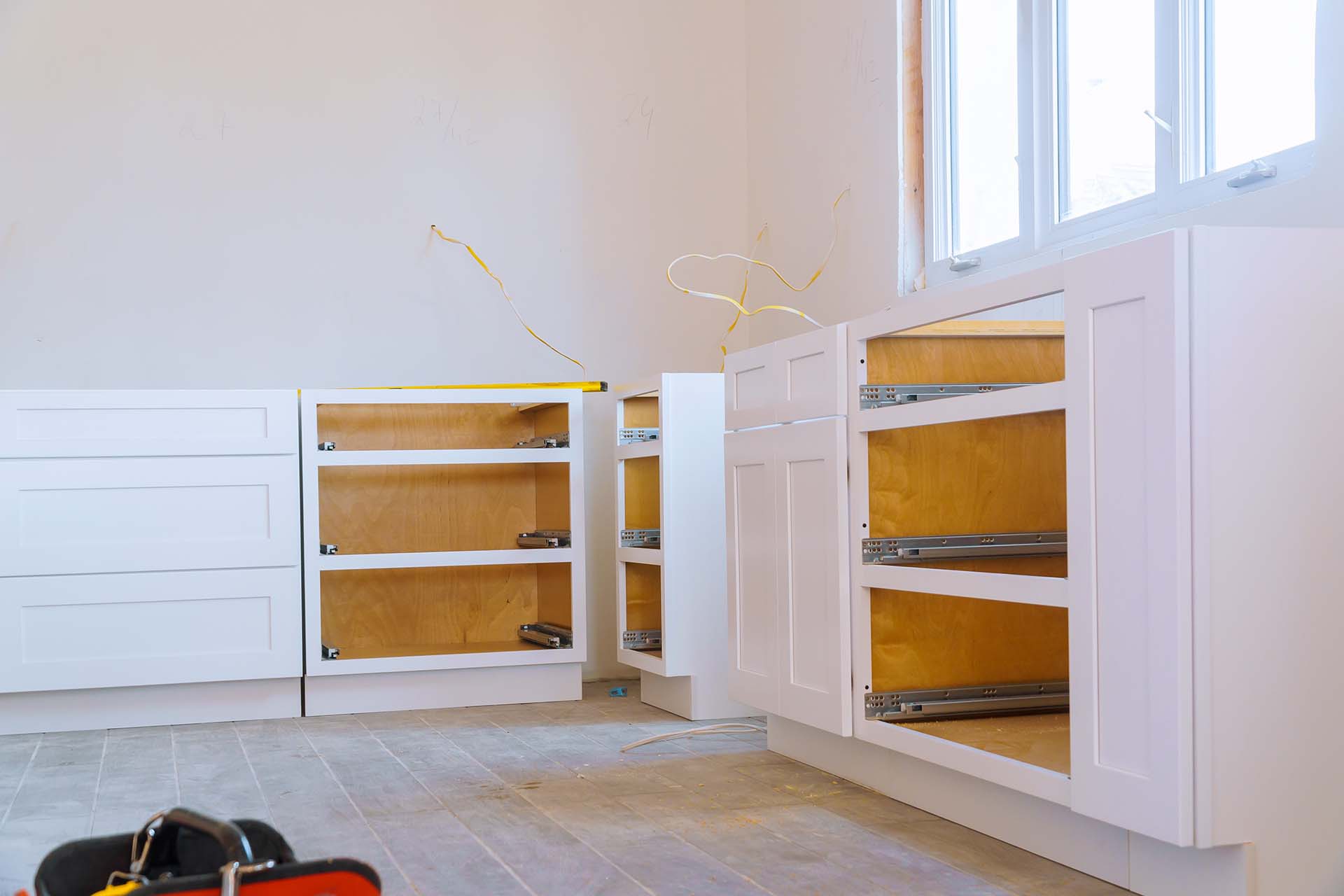 Blind cabinet island drawers and counter cabinets installed of white color